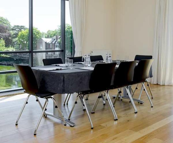 Oval boardroom table with half height conference cloth